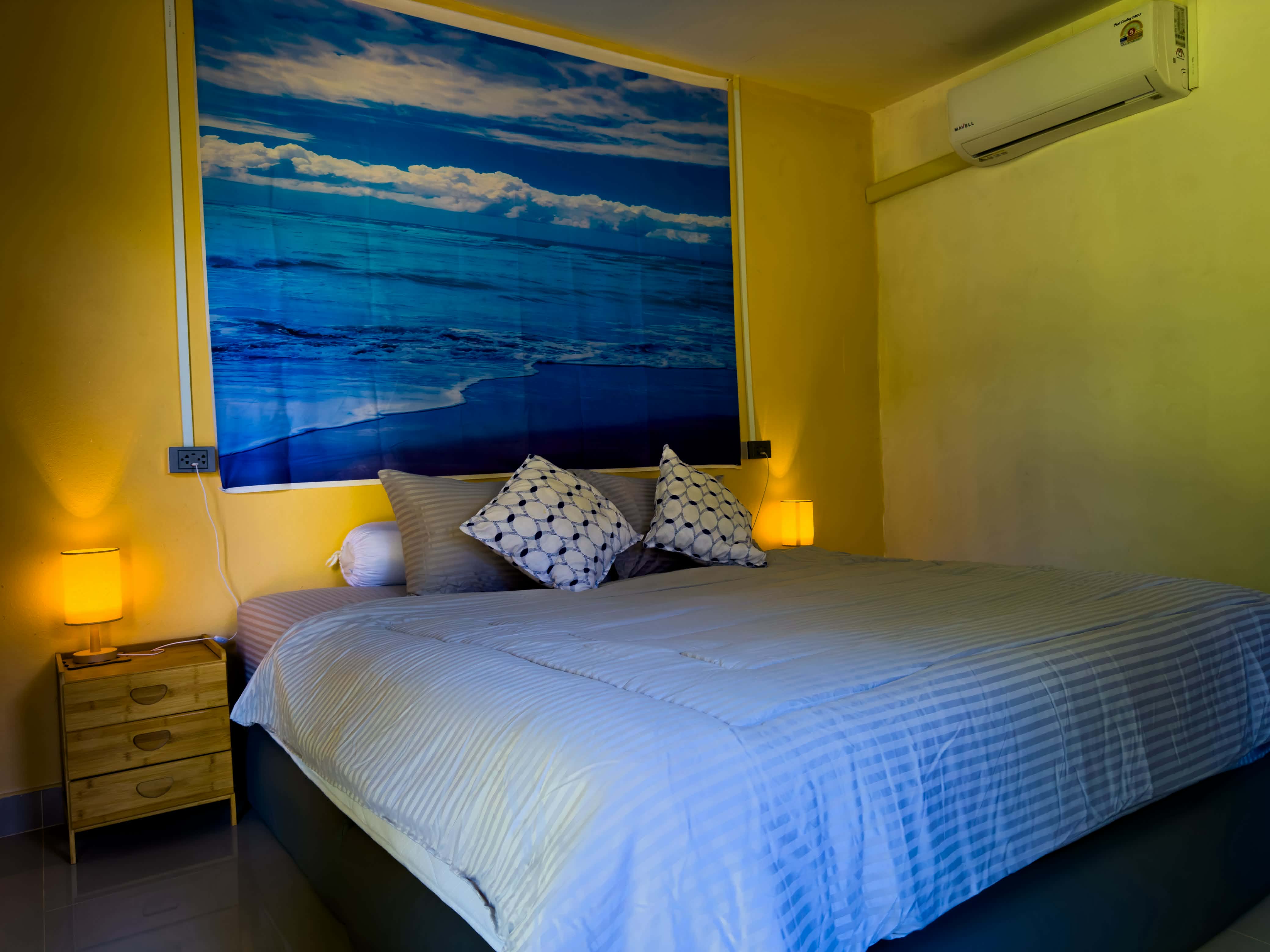 Standard bungalow bed with air conditioning
