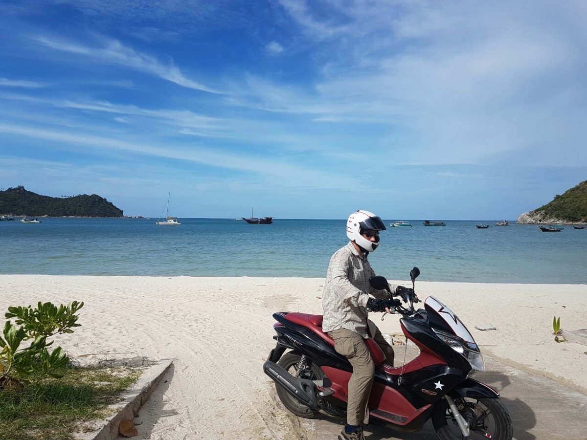 Scooter on the road near Grand Bungalow